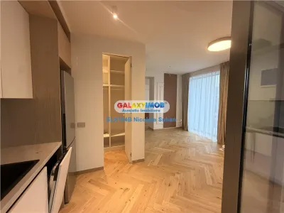 APARTAMENT LUX PIATA VICTORIEI PETRU RARES MOBILAT 2 PARCARI SUBTERANE - foto 13