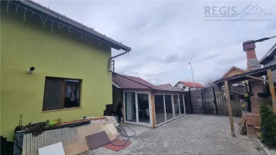 Casa de vanzare moderna cu costuri reduse, panouri solare si spatiu comercial inclus - foto 22