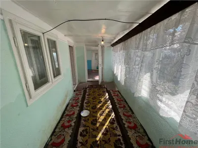 Casa batraneasca + teren 1881 mp de vanzare in Sat Milcovul - foto 11
