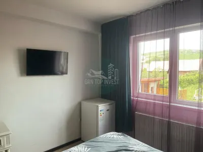 Casa cu 4 camere 3 bai si tersa in Sura Mare - foto 8