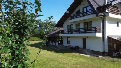 CASĂ DE VACANȚĂ DE VÂNZARE ÎN BUCOVINA | MĂLINI HERLA | 2.000 MP TEREN | 5 DORMITOARE CU BĂI PROPRII | TERASĂ 50 MP - foto 8