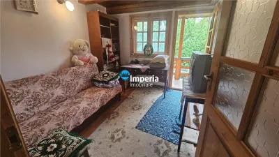 Casa deosebita in mijlocul naturii, cu teren generos si priveliste panoramica - foto 4