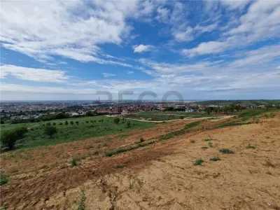 RECO Teren  intravilan- panorama asupra orasului -str. Caisilor - foto 11