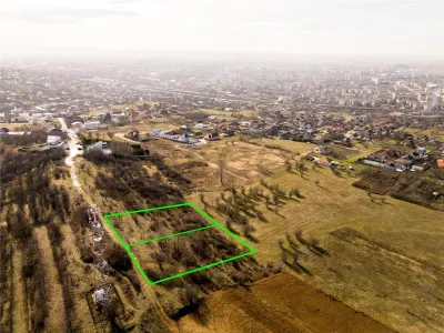 RECO Teren  intravilan- panorama asupra orasului -str. Caisilor - foto 7