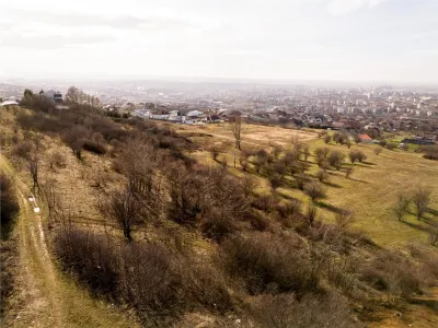 RECO Teren  intravilan- panorama asupra orasului -str. Caisilor - foto 8