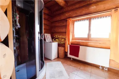 Casa din busteni cu ferma zootehnica si afacere (Tengheler, Com. Ditrau) - foto 8