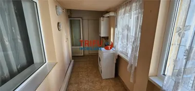 Apartament complet decomandat, 3 camere, 2 băi și garaj inclus - foto 14