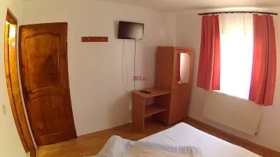 Pensiune in Arieseni cu 7 camere - foto 10