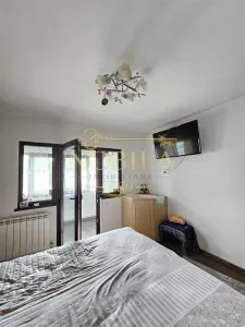 IN EXVLUSIVITATE APARTAMENT 2 CAMERE PARTER DE VANZARE IN ONESTI - foto 4