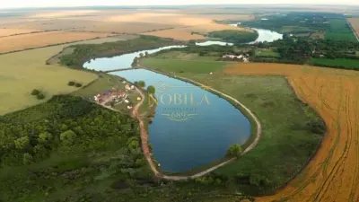 DOMENIU,13 HA TEREN(7,7 HA LUCIU DE APA,3 BALTI ,CABANE,PONTON,CAMPING RULOTE) - foto 17