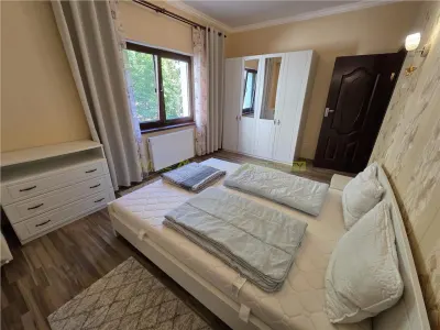 Apartament central cu acces la gradina si 2 locuri parcare - foto 6