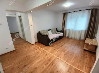 De vanzare apartament renovat cu 3 camere 2 bai si pivnita in Sibiu - foto 2