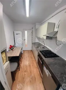 De vanzare apartament renovat cu 3 camere 2 bai si pivnita in Sibiu - foto 14