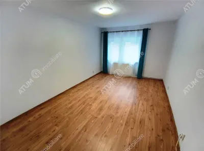 De vanzare apartament renovat cu 3 camere 2 bai si pivnita in Sibiu - foto 3