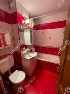 De vanzare apartament cu 3 camere decomandate si balcon situat in zona Vasile Aaron din Sibiu - foto 9