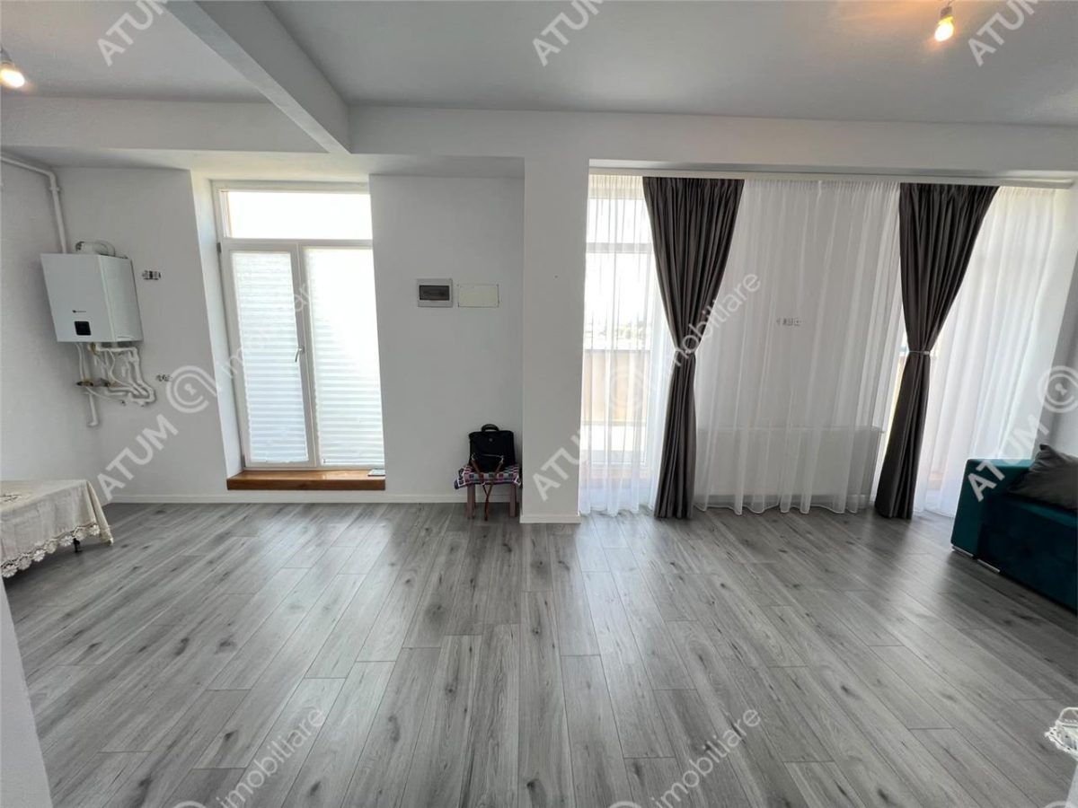 De vanzare apartament cu 2 camere terasa 40 mp si 2 locuri de parcare situat in zona Vasile Aaron din Sibiu - Sibiu