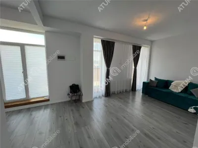 De vanzare apartament cu 2 camere terasa 40 mp si 2 locuri de parcare situat in zona Vasile Aaron din Sibiu - foto 2