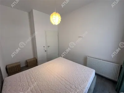 De vanzare apartament cu 2 camere terasa 40 mp si 2 locuri de parcare situat in zona Vasile Aaron din Sibiu - foto 17
