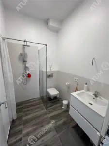De vanzare apartament cu 2 camere terasa 40 mp si 2 locuri de parcare situat in zona Vasile Aaron din Sibiu - foto 18