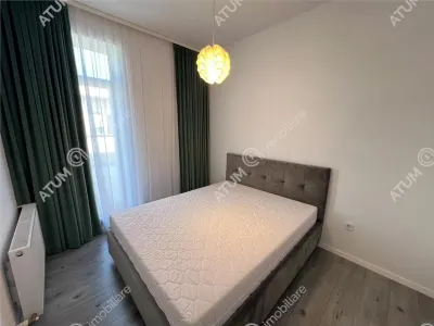 De vanzare apartament cu 2 camere terasa 40 mp si 2 locuri de parcare situat in zona Vasile Aaron din Sibiu - foto 4