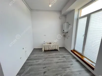 De vanzare apartament cu 2 camere terasa 40 mp si 2 locuri de parcare situat in zona Vasile Aaron din Sibiu - foto 6