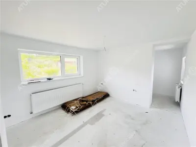 Casa individuala de vanzare 4 camere 2 bai si terasa pe teren 1170 mp in Cisnadioara - foto 4