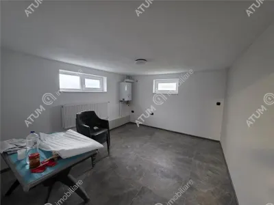 Casa individuala de vanzare cu 4 camere decomandate curte libera de 330 mp si garaj la demisol in comuna Selimbar din Sibiu - foto 20
