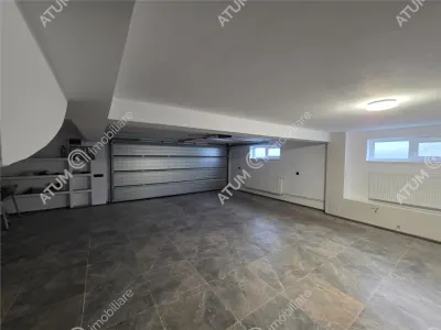 Casa individuala de vanzare cu 4 camere decomandate curte libera de 330 mp si garaj la demisol in comuna Selimbar din Sibiu - foto 22