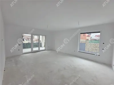 Casa individuala de vanzare cu 4 camere decomandate curte libera de 330 mp si garaj la demisol in comuna Selimbar din Sibiu - foto 10