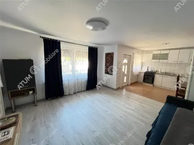 Casa individuala de inchiriat cu 3 camere 3 bucatarii pivnita situata in localitatea Poplaca din Sibiu - Poplaca