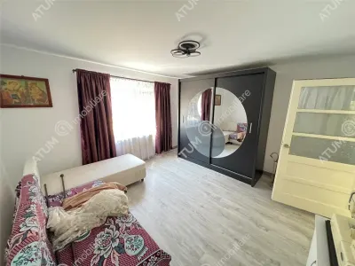 Casa individuala de inchiriat cu 3 camere 3 bucatarii pivnita situata in localitatea Poplaca din Sibiu - foto 5