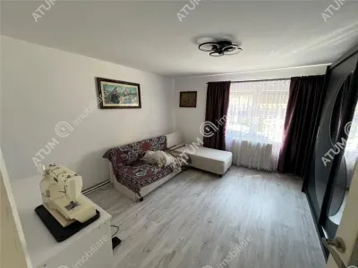 Casa individuala de inchiriat cu 3 camere 3 bucatarii pivnita situata in localitatea Poplaca din Sibiu - foto 6