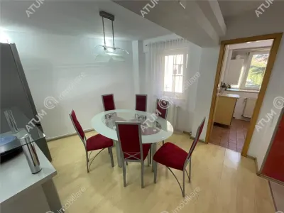 De inchiriat apartament cu 3 camere decomandate si 2 balcoane amplasat la etaj intermediar 1 in zona centrala din Sibiu - foto 9
