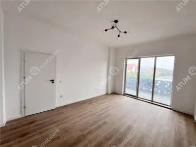 Apartament cu 3 camere decomandate 2 bai si 2 balcoane de vanzare in Sibiu zona Rahovei - foto 2