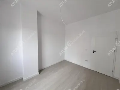 Apartament cu 3 camere decomandate 2 bai si 2 balcoane de vanzare in Sibiu zona Rahovei - foto 19