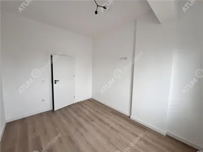 Apartament cu 3 camere decomandate 2 bai si 2 balcoane de vanzare in Sibiu zona Rahovei - foto 22