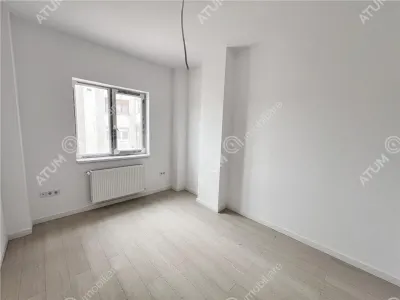 Apartament cu 3 camere decomandate 2 bai si 2 balcoane de vanzare in Sibiu zona Rahovei - foto 4
