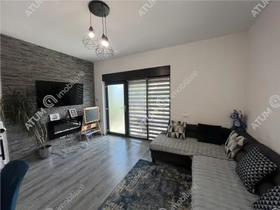 De vanzare apartament cu 3 camere decomandate si gradina proprie de 85 mp in Selimbar zona Brana - foto 2