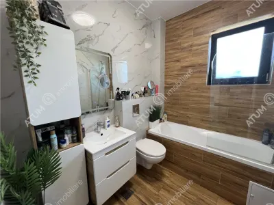 De vanzare apartament cu 3 camere decomandate si gradina proprie de 85 mp in Selimbar zona Brana - foto 9