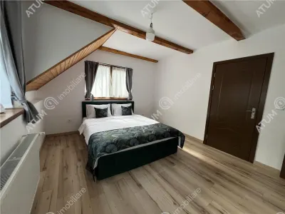 De vanzare cabana cu 7 camere 7 bai si teren 1000 mp in Avrig zona Mlaci - foto 6