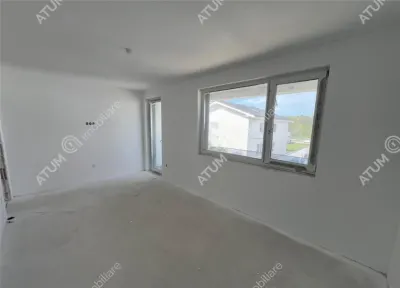 Casa de vanzare cu 4 camere 2 bai 2 balcoane si curte libera de 50 mp situata in zona Calea Cisnadiei din Sibiu - foto 4