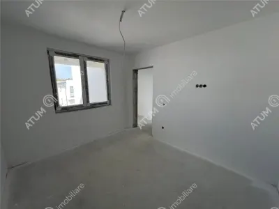 Casa de vanzare cu 4 camere 2 bai 2 balcoane si curte libera de 50 mp situata in zona Calea Cisnadiei din Sibiu - foto 5