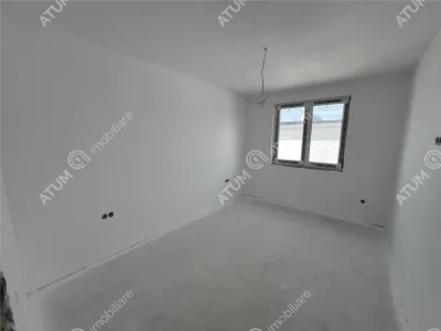 Casa de vanzare cu 4 camere 2 bai 2 balcoane si curte libera de 50 mp situata in zona Calea Cisnadiei din Sibiu - foto 8