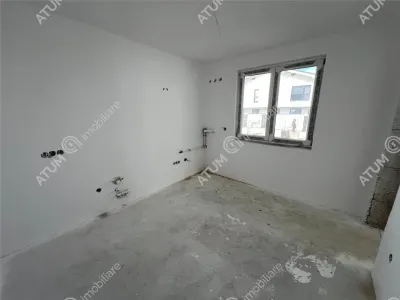Casa de vanzare cu 4 camere 2 bai 2 balcoane si curte libera de 50 mp situata in zona Calea Cisnadiei din Sibiu - foto 9