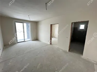 De vanzare apartament intabulat cu 3 camere decomandate 2 bai balcon si loc de parcare situat in Talmaciu/ Sibiu - Talmaciu