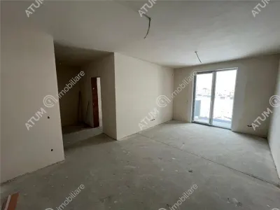De vanzare apartament intabulat cu 3 camere decomandate 2 bai balcon si loc de parcare situat in Talmaciu/ Sibiu - foto 2