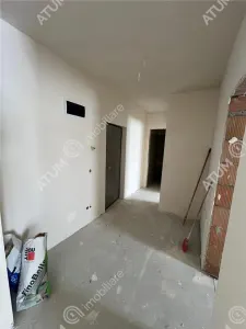 De vanzare apartament intabulat cu 3 camere decomandate 2 bai balcon si loc de parcare situat in Talmaciu/ Sibiu - foto 12