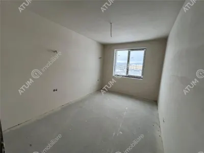 De vanzare apartament intabulat cu 3 camere decomandate 2 bai balcon si loc de parcare situat in Talmaciu/ Sibiu - foto 5