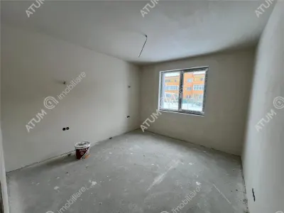 De vanzare apartament intabulat cu 2 camere decomandate balcon si loc de parcare situat in Talmaciu/ Sibiu - foto 3