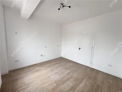 Apartament cu 2 camere decomandate 64 mp si 2 balcoane de vanzare in zona Rahovei din Sibiu - foto 11